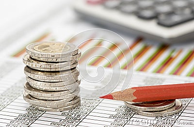 Stacked euro coins on table sheet Stock Photo