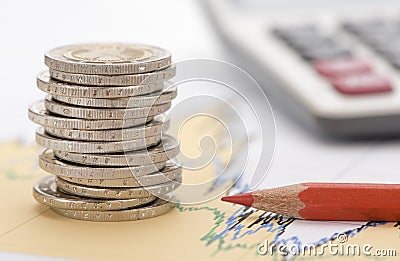 Stacked euro coins on table sheet Stock Photo