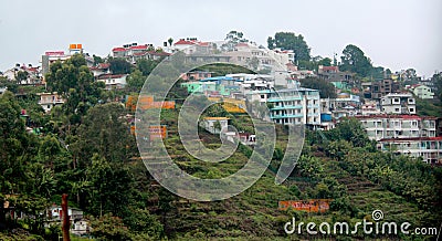 Stacked houses built and trees on the kodaikanal tour place. Stock Photo