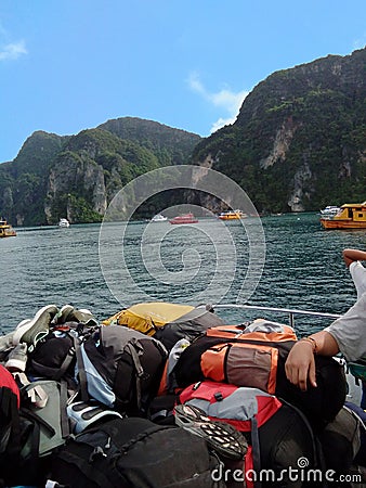 Stacked luggage with sea and mountain view Editorial Stock Photo