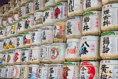 Stacked sake barrels on entrance to meiji jingu Editorial Stock Photo