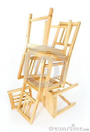 Stacked wooden chairs Stock Photo