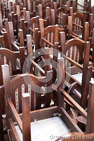 Stacked wooden classic chairs, vintage objects Stock Photo