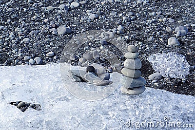 Stacking stones on iceberg Stock Photo