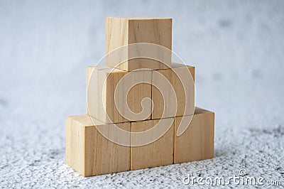 Stacking wooden cubes with customizable space for text. Copy space concept. Stock Photo