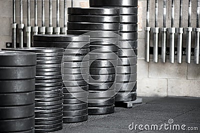 Stacks of assorted sized weights in a gym Stock Photo