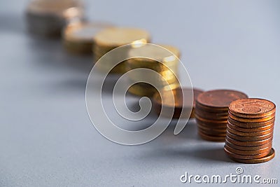 Stacks of coins. Blurred euro coins. Soft focus Stock Photo