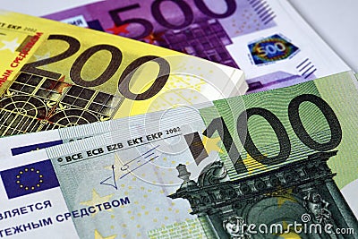 Stacks of Euro bills in large denominations Stock Photo