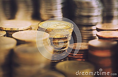 Stacks of golden euro coins Stock Photo