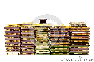 Stacks of old CPU chips and obsolete computer processors isolated on white Stock Photo