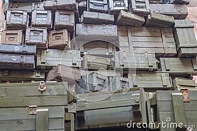 Stacks of old military ammunition boxes Stock Photo
