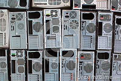 Stacks of old personal computers and pc cases Stock Photo