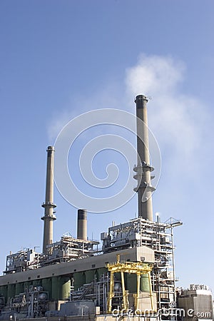 Stacks smoking at the powerplant Stock Photo