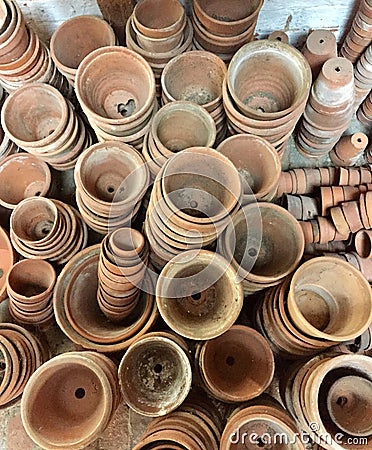 Stacks of terracotta plant pots Stock Photo