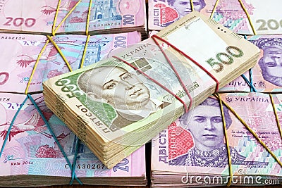 Stacks of Ukrainian hryvnia banknotes. The money of Ukraine Stock Photo