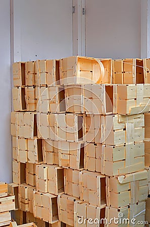 Stacks of wooden baskets for self picking berries on a farm Stock Photo