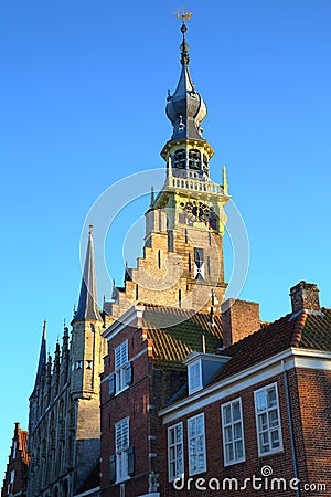 The Stadhuis town hall with its impressive clock tower in Veere, Zeeland Stock Photo