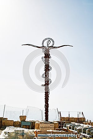 The Staff of Moses also called The Brazen Serpent sculpture by the artist Giovanni Fantoni on the top Editorial Stock Photo