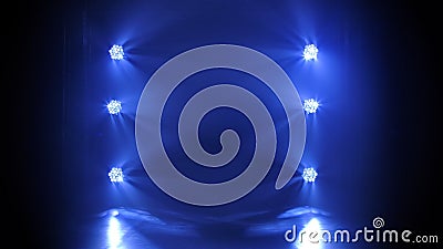 Stage with blue luminescent spotlighting. Shining empty scene for holiday show, award ceremony or advertising on the Stock Photo