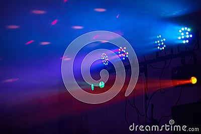 Stage lights in action at the concert. Lights show. Lazer show. Stock Photo