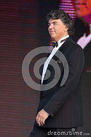 On stage singing opera singer, actor, pop star, idol of the soviet and russian music of Sergei Zakharov Editorial Stock Photo