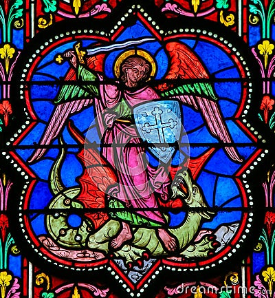 Stained Glass - the Archangel Michael vanquishing Satan Stock Photo