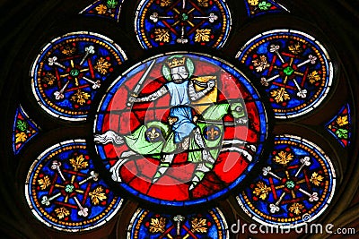 Stained Glass in Notre Dame, Paris, of a Medieval Knight Editorial Stock Photo