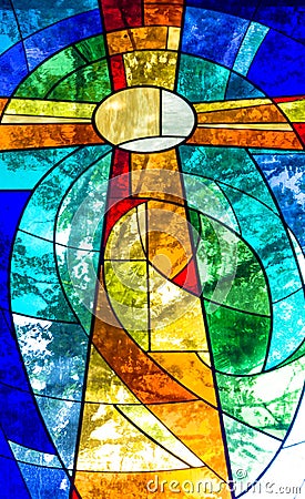 Stained glass cross in bright vivid colors Editorial Stock Photo