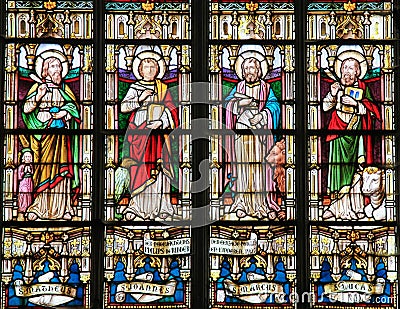 Stained Glass depicting the Four Evangelists Editorial Stock Photo