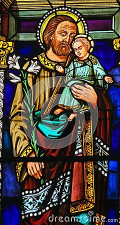 Stained Glass - Joseph and the Child Jesus Editorial Stock Photo