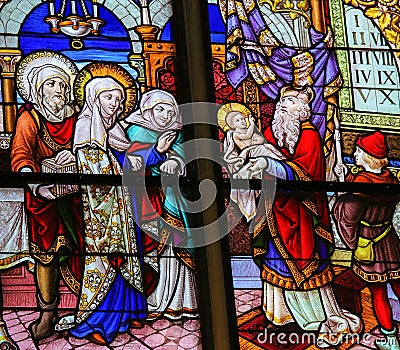 Stained Glass in Mechelen Cathedral - Presentation at the Temple Stock Photo