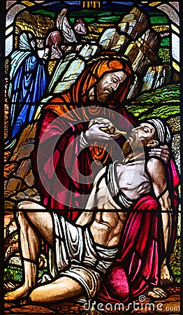 Stained Glass Window Depicting the Good Samaritan in Roxton Chapel. Editorial Stock Photo