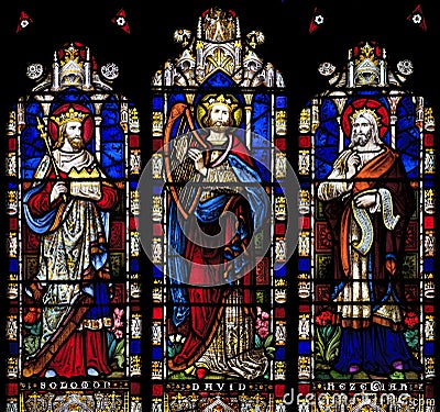 Stained Glass window depicting Solomon, David and Hezekiah in Saint Nicholas Church, Arundel, West-Sussex Stock Photo