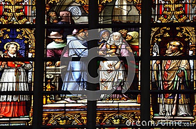 Stained glass window in old church in Belgium Stock Photo