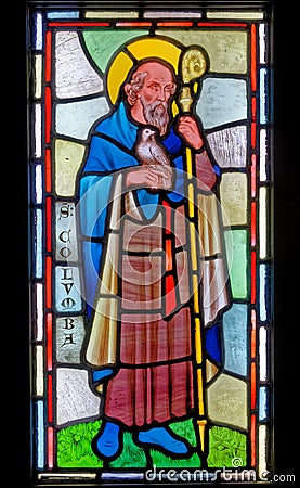 Stained glass window of Saint Columba at Red Castle - Wales Editorial Stock Photo