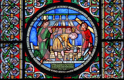 Stained glass window showing the building of Noahs Ark Stock Photo