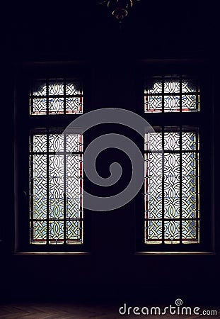 Stained glass on windows in Cantacuzino castle, Prahova county, Stock Photo