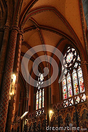 Stained-glass windows decorate one of the chapels of Saint-AndrÃ© cathedral in Bordeaux (France) Stock Photo