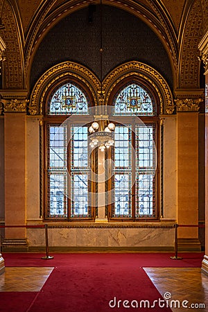 Stained glasses under gold rib vaults ceiling in Budapest Stock Photo