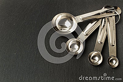Stainles steel spoons to measure Stock Photo