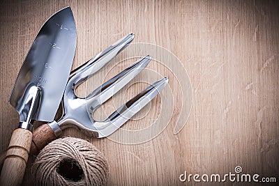 Stainless hand shovel trowel fork and hank of Stock Photo