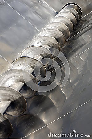 stainless steel auger pressure grapes at winery Stock Photo