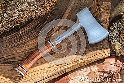 Axe full tang with leather handle for woodman, buschcraft and wilderness life in the jungle and woods Vector Illustration