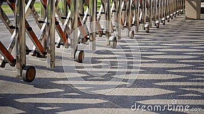 Stainless steel barrier gate or folding fence gate Stock Photo