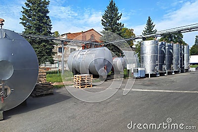 Stainless steel ethanol storage tanks. Ground storage. Stock Photo