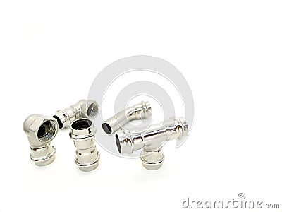 Stainless steel fittings pipe on white background Stock Photo