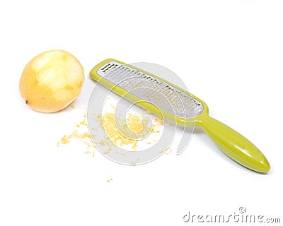 Stainless steel grate zester with lemon Stock Photo