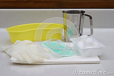 Stainless steel jug with medical supply for cleansing Stock Photo
