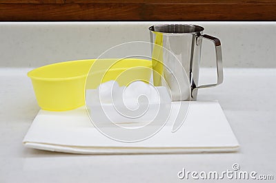 Stainless steel jug with medical supply Stock Photo