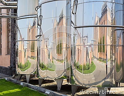 Stainless steel vessels for production of wine in modern winery Stock Photo